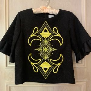 Embroidered brocade top with fluted sleeves